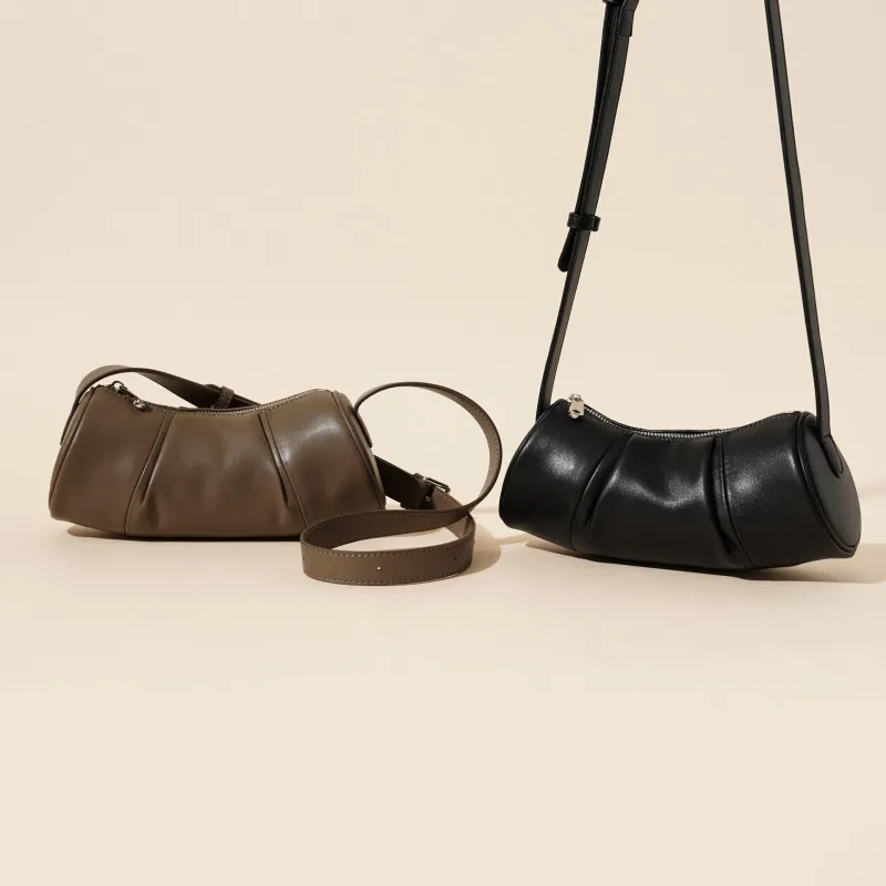 Paras suunnittelijalakonahkainen olkapäälaukut yhdellä hihnalla