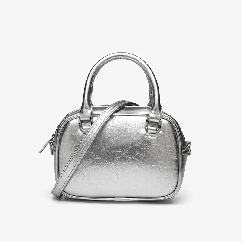 Naisten trendikkäät, metalliset ristikkäiset olkapäälaukut