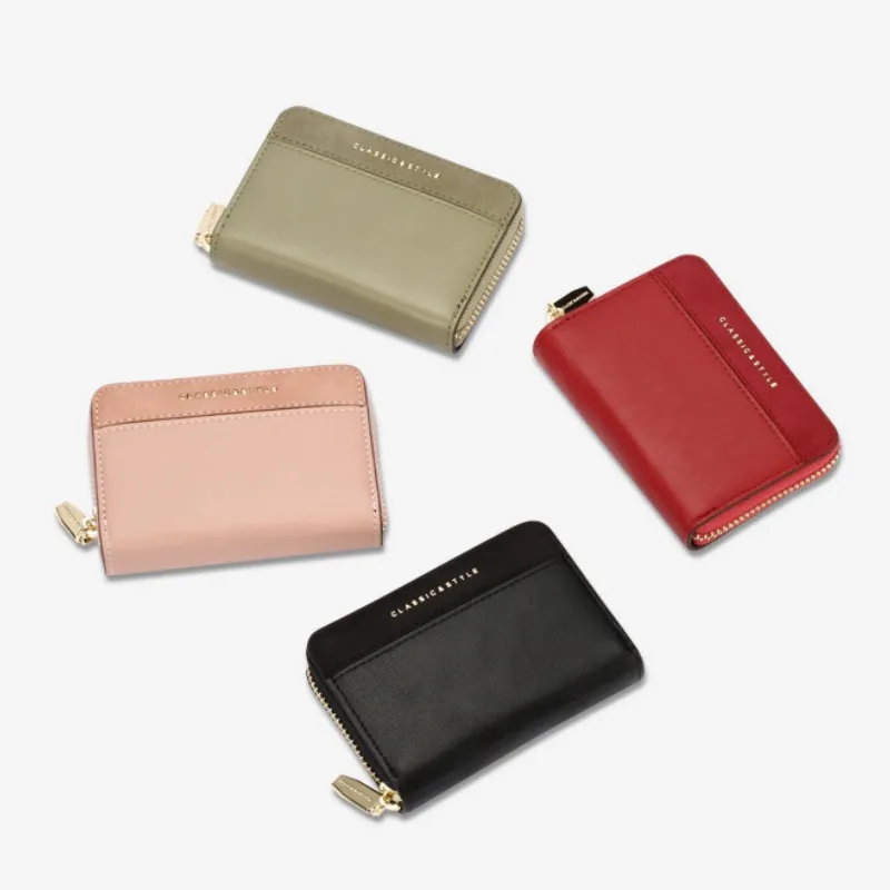 Naisten pieni nahkainen luottokorttikotelo vetoketjulla